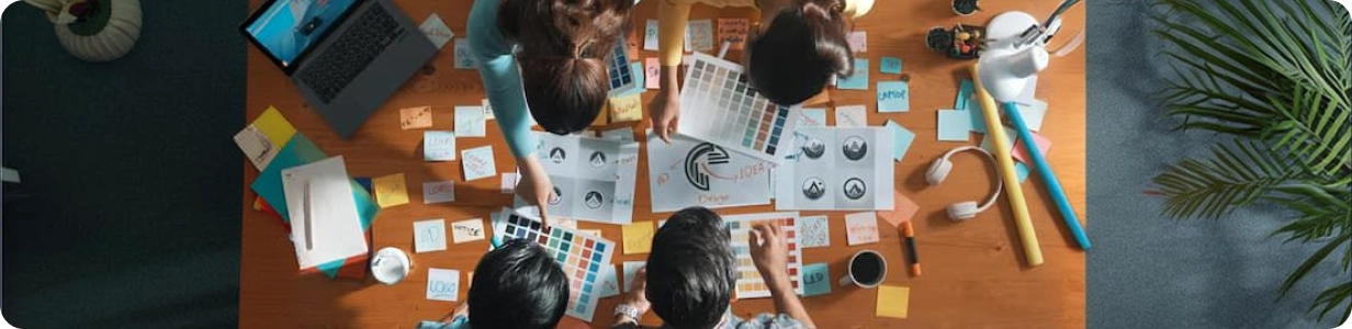 Team collaborating around a workspace board